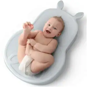 BABYPAL with a little baby on waiting for a nappy change