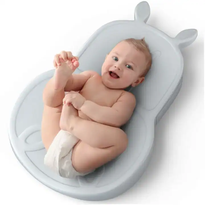 BABYPAL with a little baby on waiting for a nappy change