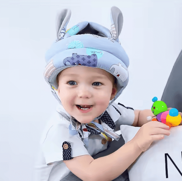 A young boy wearing a Bouncecap protective headgear