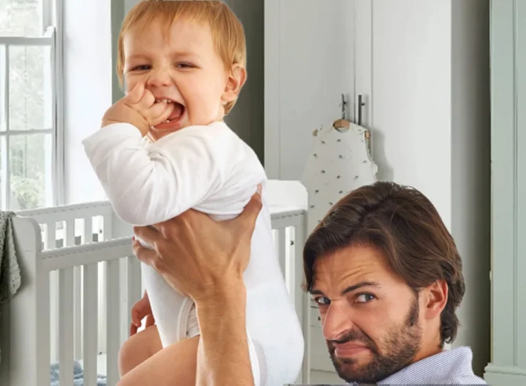 Daddy Holding up Baby with poo diaper